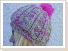 Lova - Mütze mit Pink Pompom Lova - Mütze mit Pink Pompom
